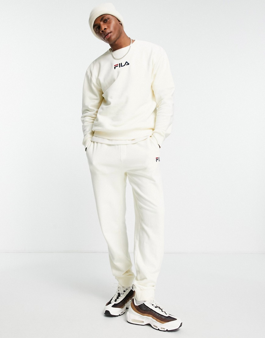 Fila – Jogginghose in gebrochenem Weiß mit Logo günstig online kaufen