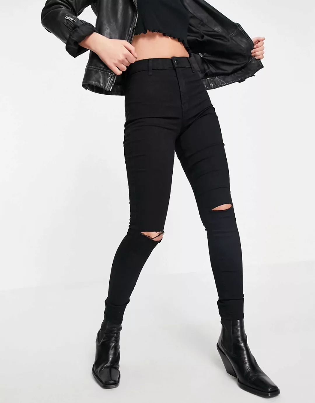 Topshop – Joni – Jeans aus einem recycelten Baumwollmix in Schwarz mit Riss günstig online kaufen