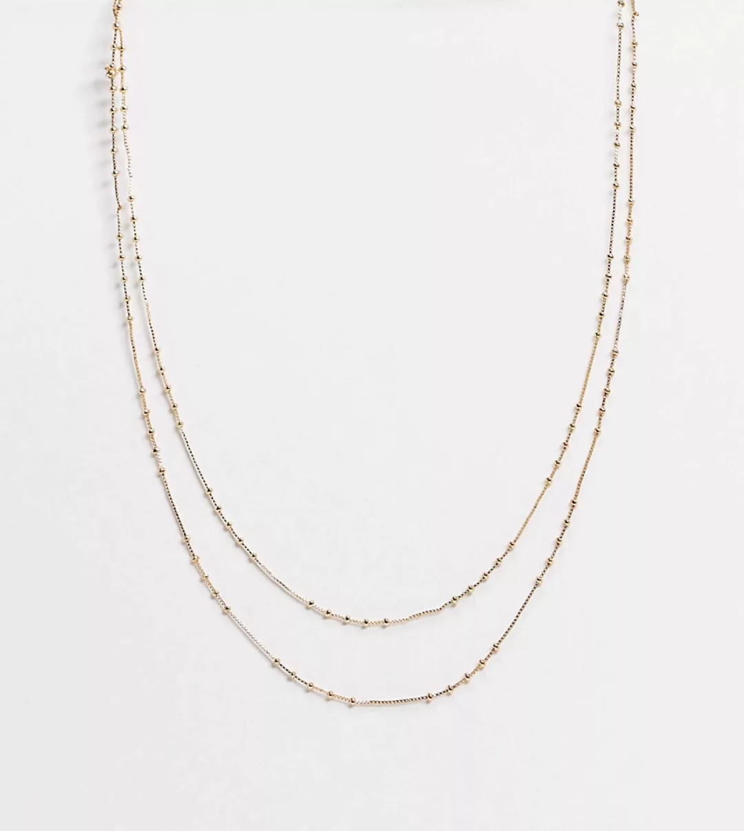 ASOS DESIGN – 2er-Pack 14 Karat goldfarbene Halsketten im Punkt-Strich-Desi günstig online kaufen