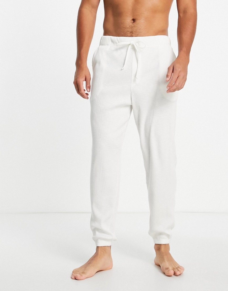 ASOS DESIGN – Gerippte Lounge-Jogginghose in Creme-Grün günstig online kaufen