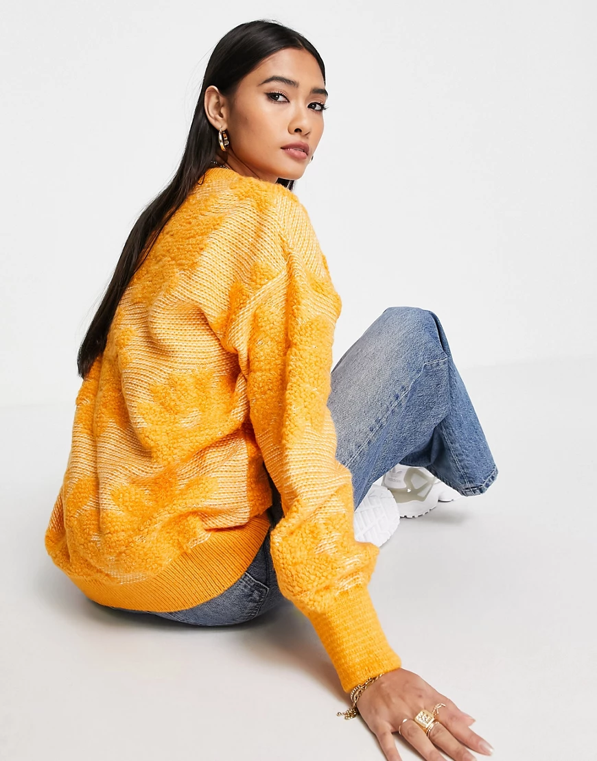 ASOS DESIGN – Pullover mit strukturiertem Blumenmuster in Orange günstig online kaufen