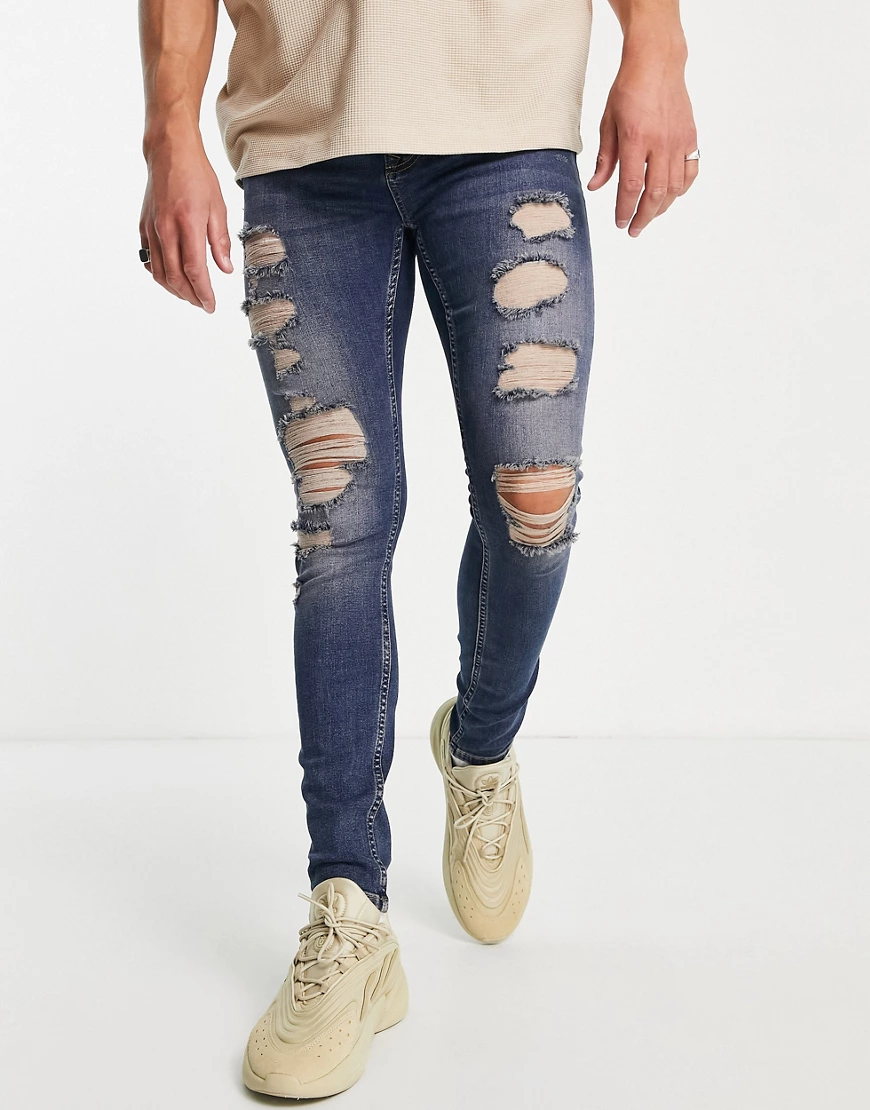 Topman – Hautenge Jeans in mittlerer Waschung mit extremen Zierrissen-Blau günstig online kaufen