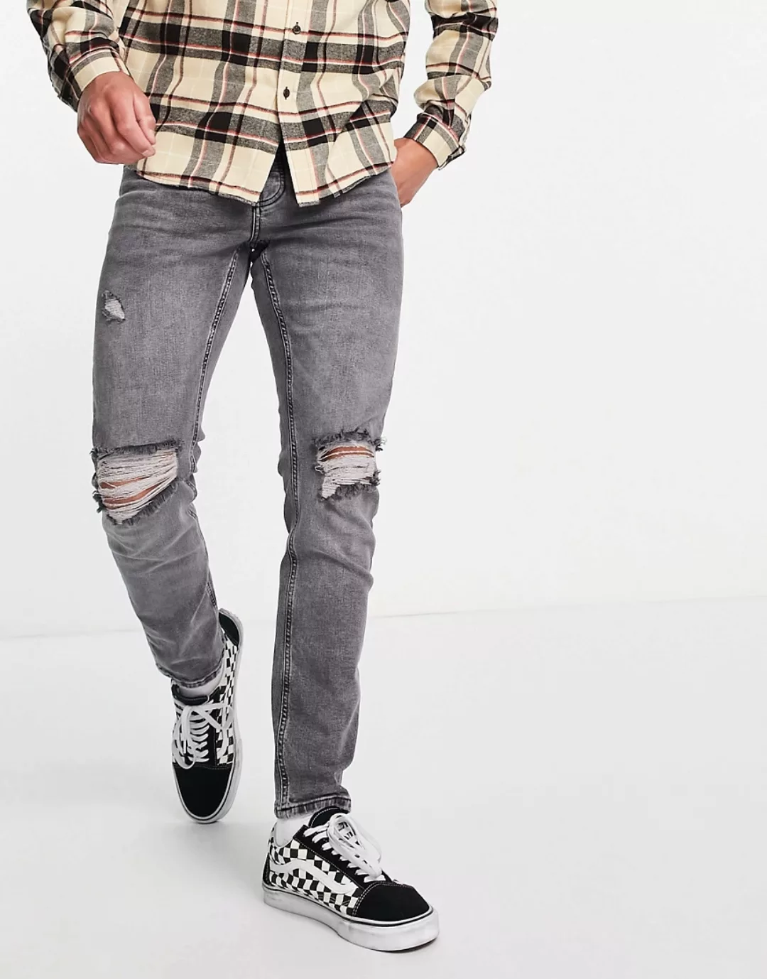 ASOS DESIGN – Schmal geschnittene Stretch-Jeans in verwaschenem Grau mit Ri günstig online kaufen