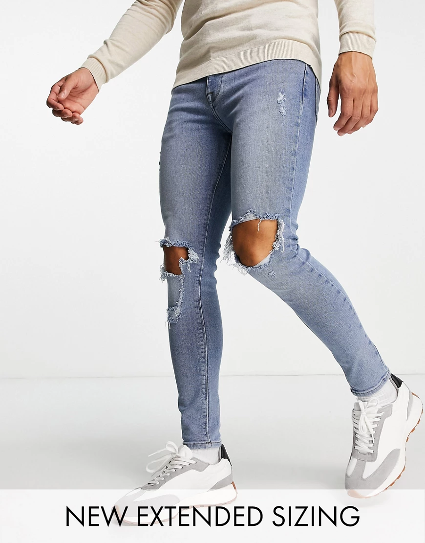 ASOS DESIGN – Spray-on-Jeans in mittlerer Waschung mit Power-Stretch, Zierr günstig online kaufen