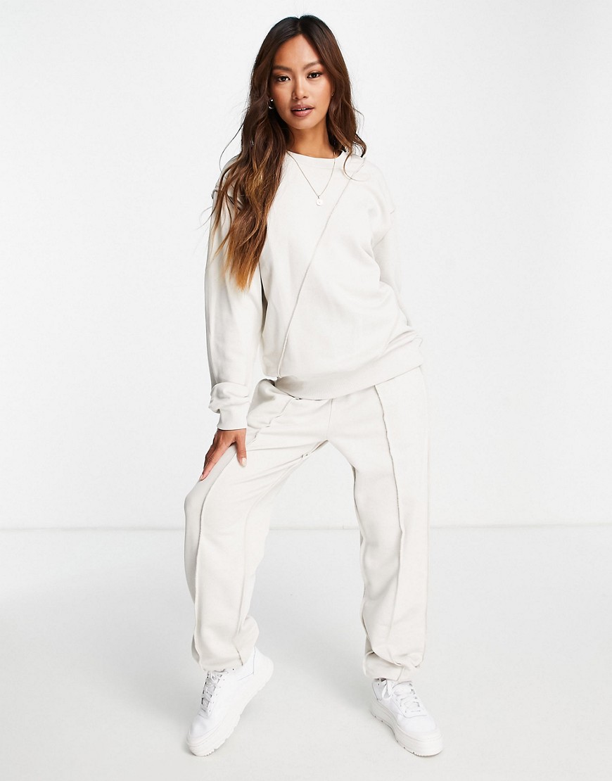 ASOS DESIGN – Trainingsanzug aus Kapuzenpullover und Jogginghose in Stein m günstig online kaufen