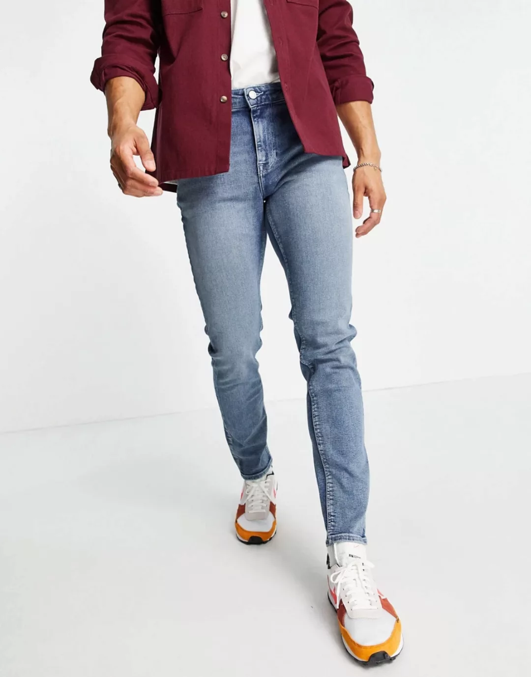 ASOS DESIGN – Skinny-Jeans in hellblauer Waschung mit Tönung günstig online kaufen