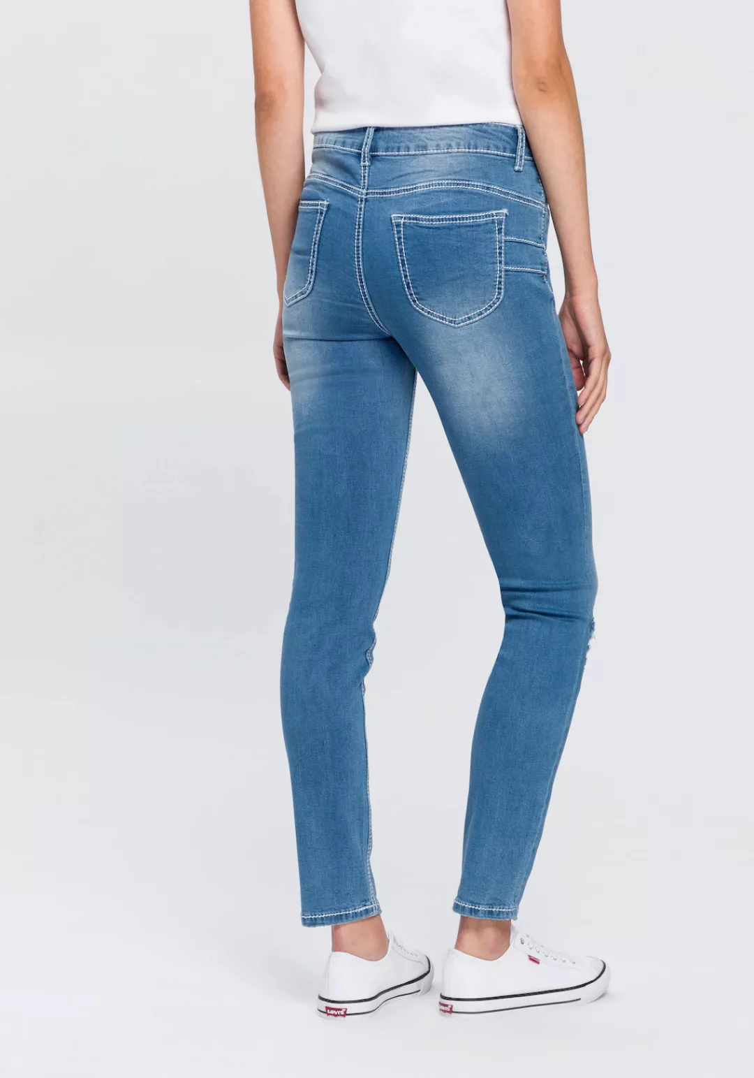 Arizona Slim-fit-Jeans "mit sichtbarer, schräger Knopfleiste" günstig online kaufen