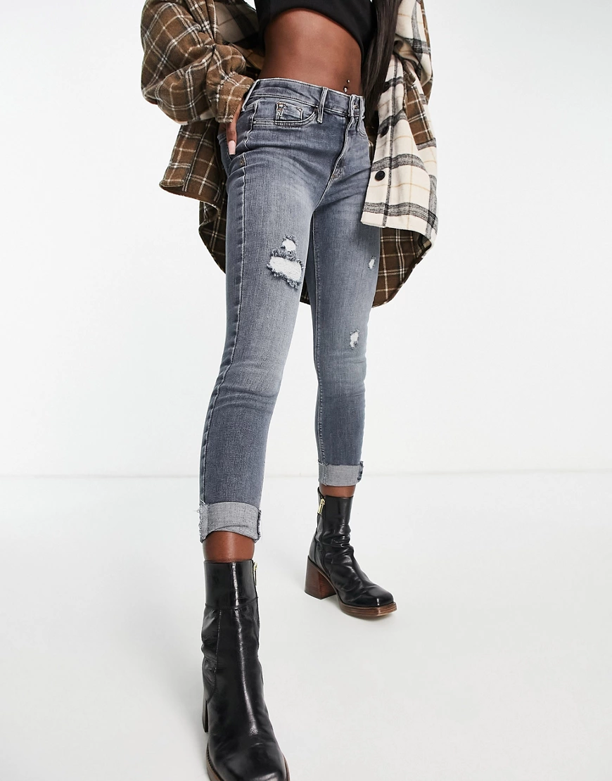 River Island – Molly – Eng geschnittene Jeans aus dunklem Denim mit mittelh günstig online kaufen