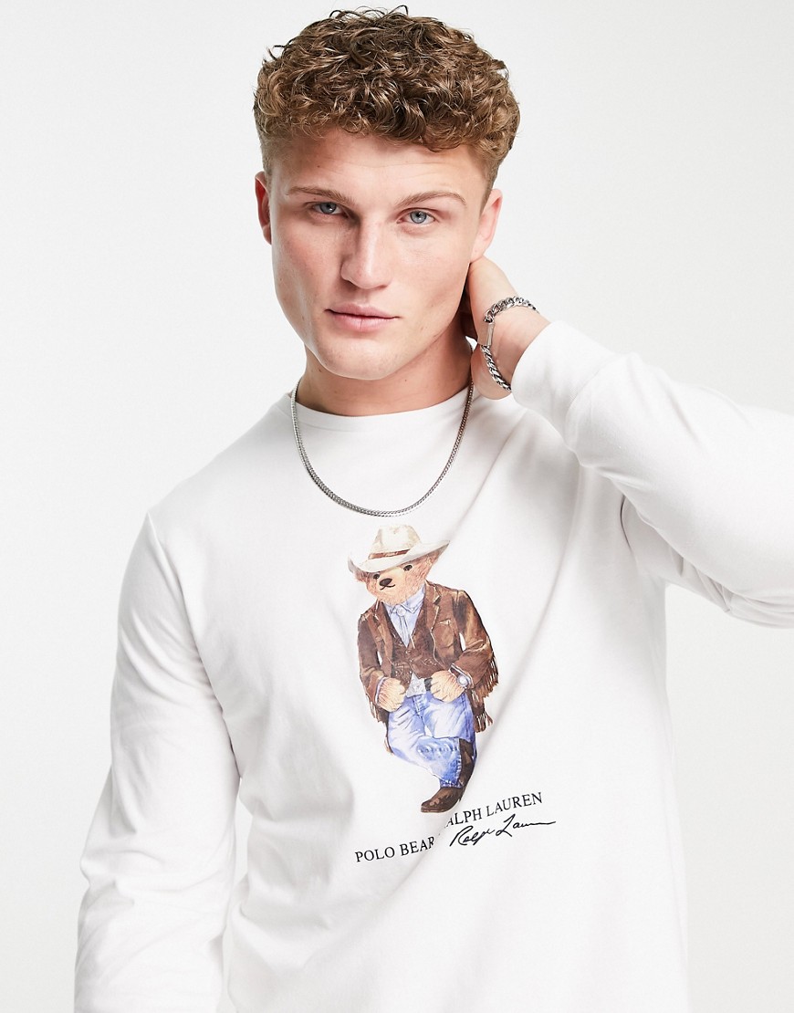 Polo Ralph Lauren – Langärmliges Oberteil in Weiß mit Cowboy-Bärenprint günstig online kaufen