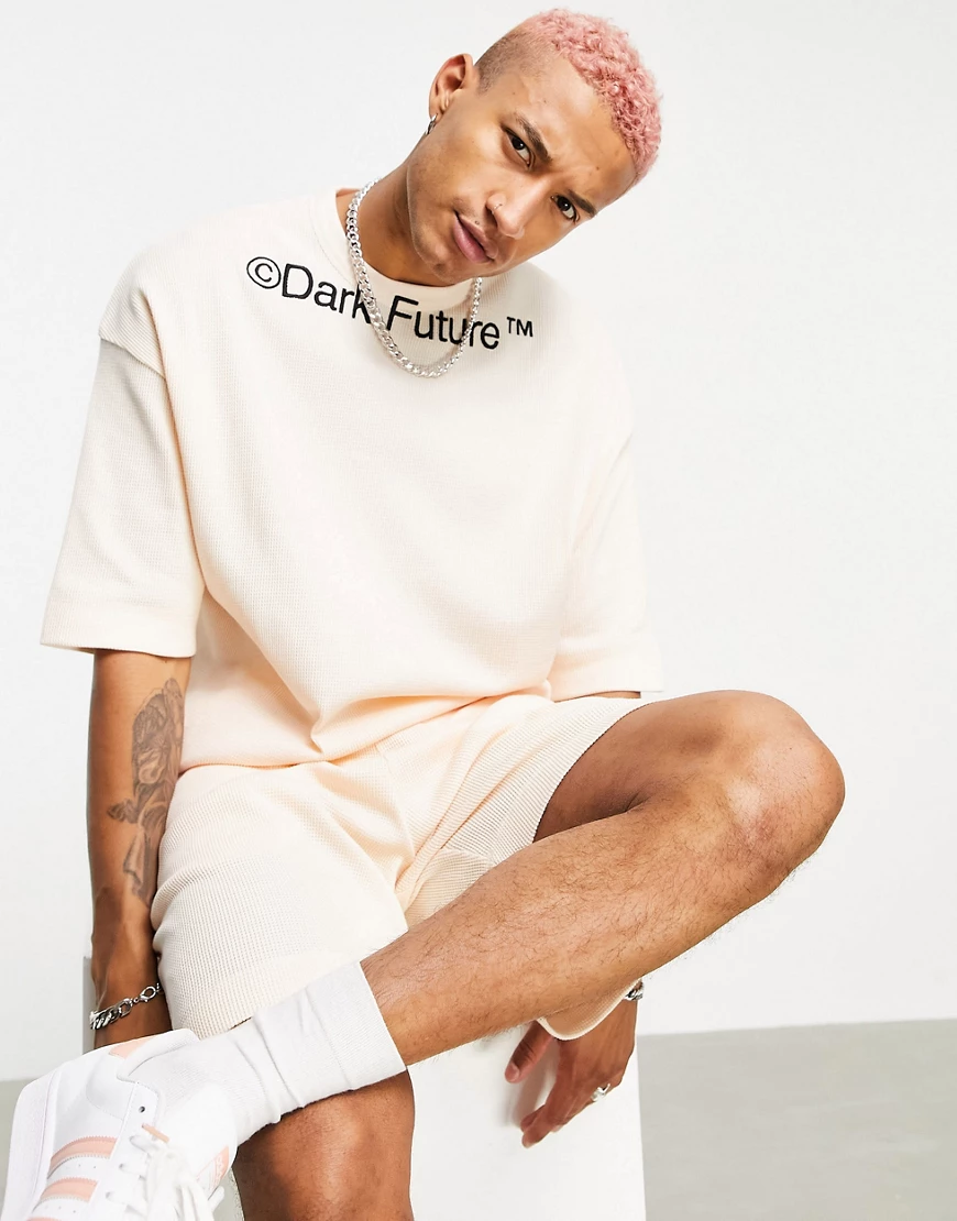 ASOS Dark Future – Oversize-Sweatshirt mit kurzen Ärmeln und leichter Waffe günstig online kaufen