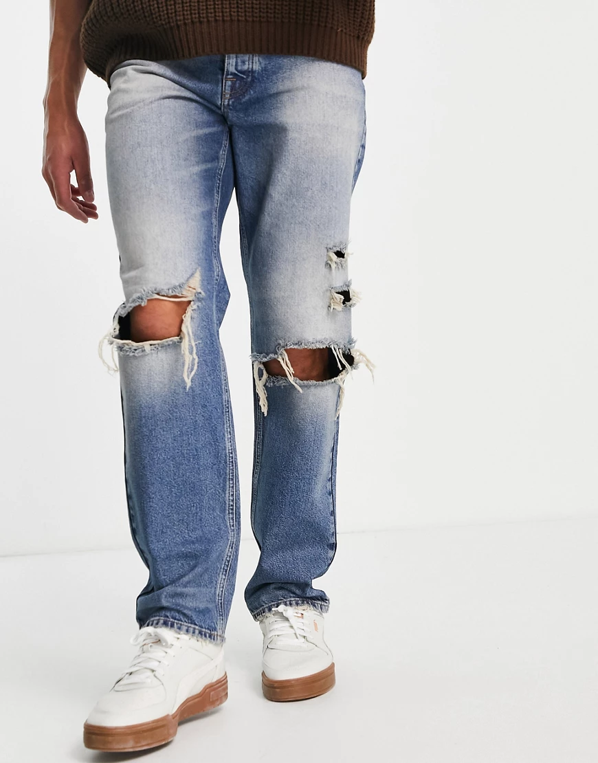 ASOS DESIGN – Stretch-Jeans mit geradem Bein und Knierissen in mittlerer Vi günstig online kaufen