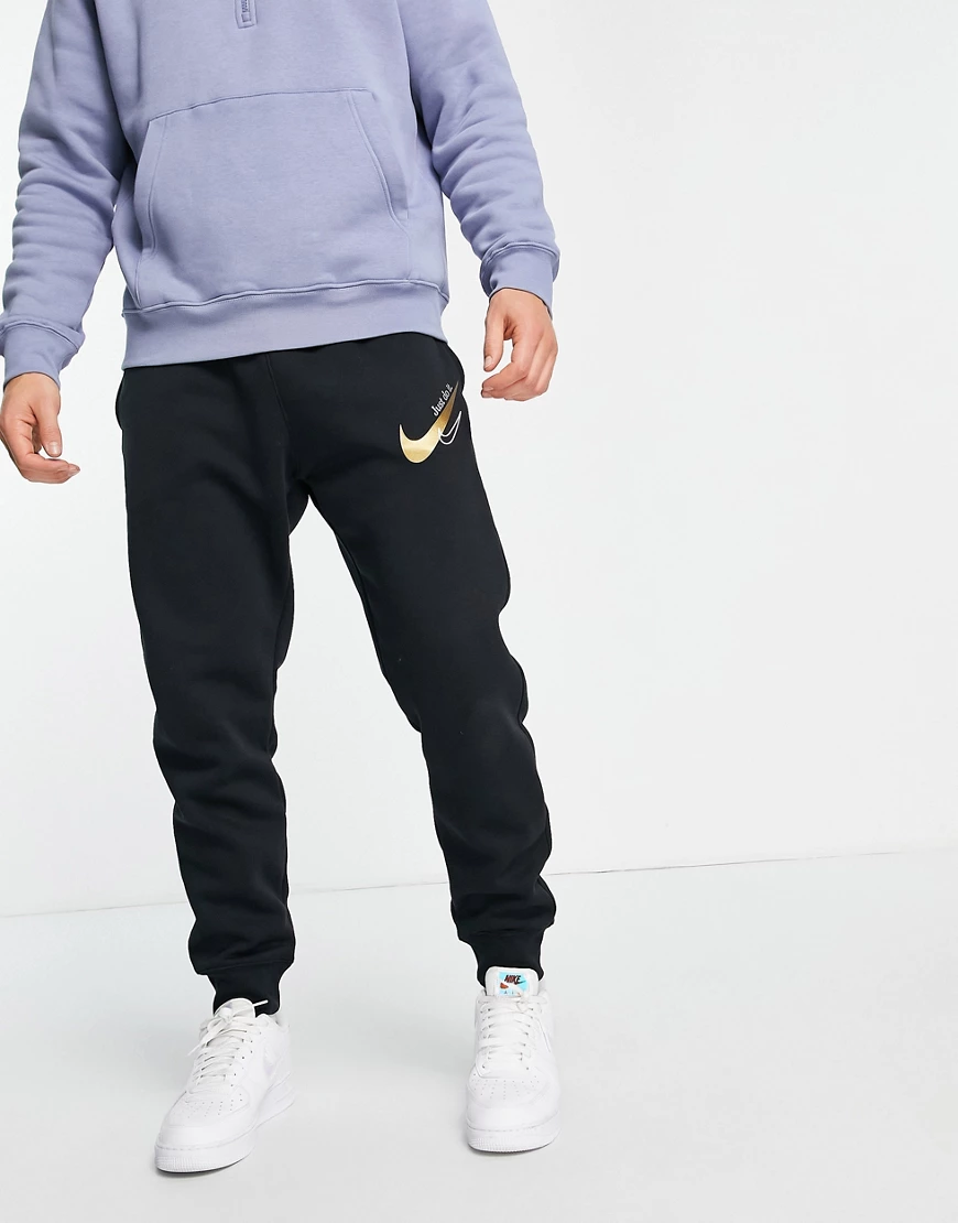 Nike – Jogginghose mit Bündchen und Logo in Schwarz und Gold günstig online kaufen