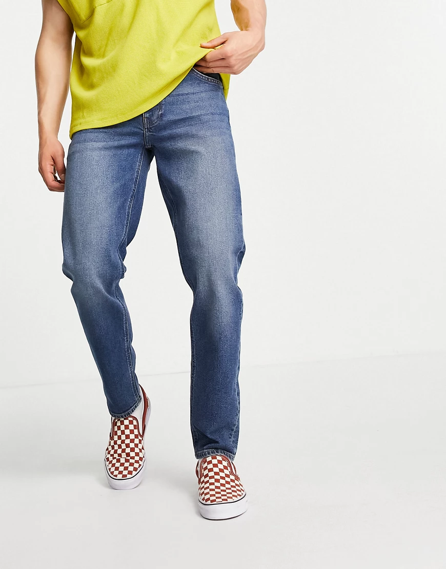 ASOS DESIGN – Schmal zulaufende Stretch-Jeans in dunkler Waschung-Blau günstig online kaufen