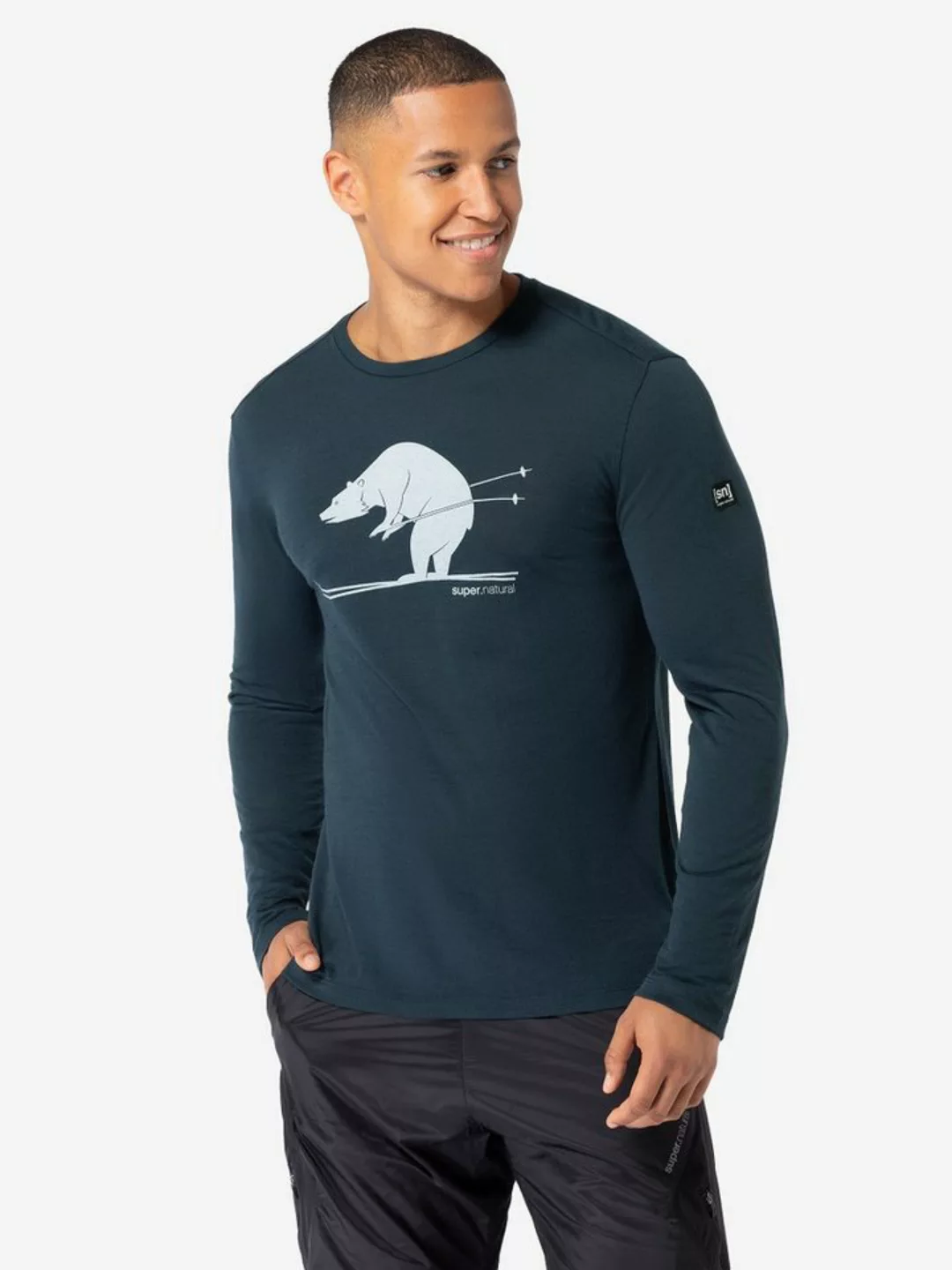 SUPER.NATURAL Langarmshirt für Herren, Merino SKI KARL Ski Motiv, atmungsak günstig online kaufen