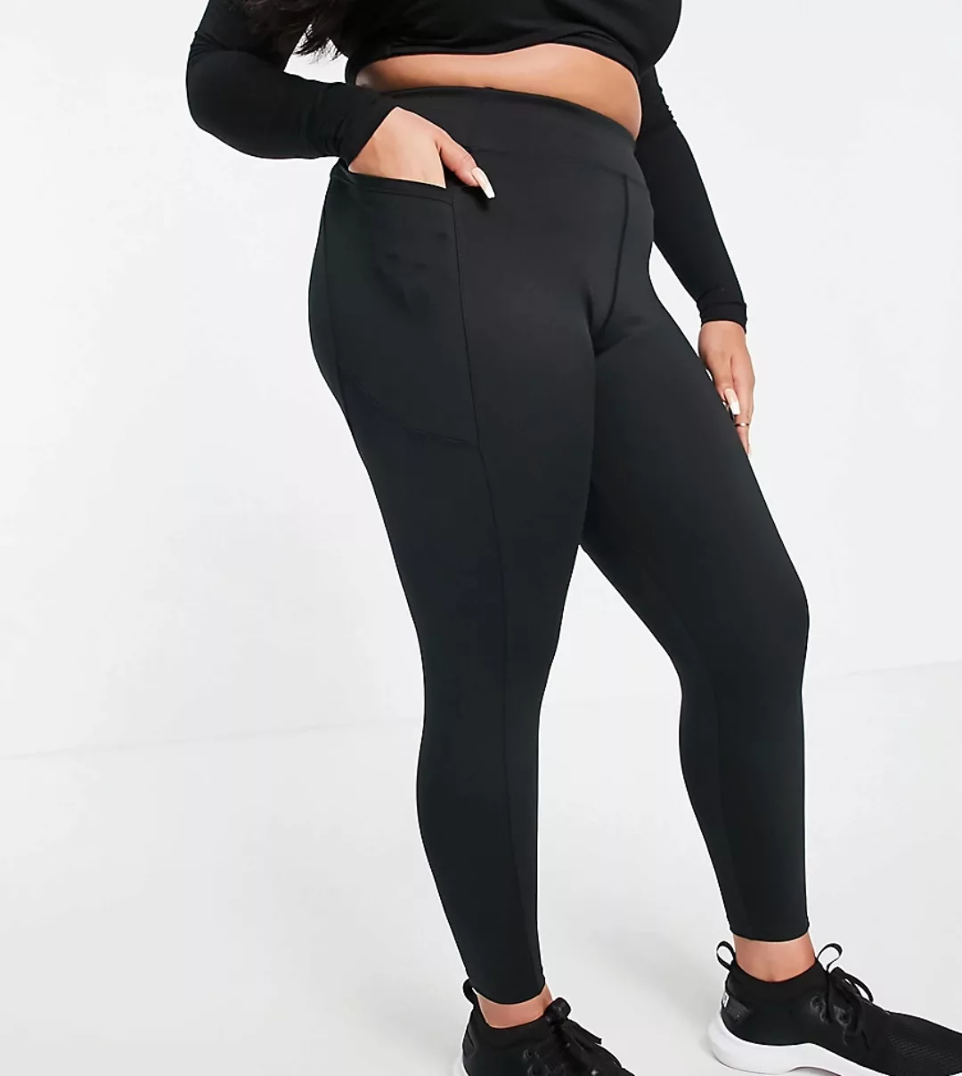 ASOS 4505 Curve – Leggings mit figurformendem Saumdetail am Bauch und Tasch günstig online kaufen