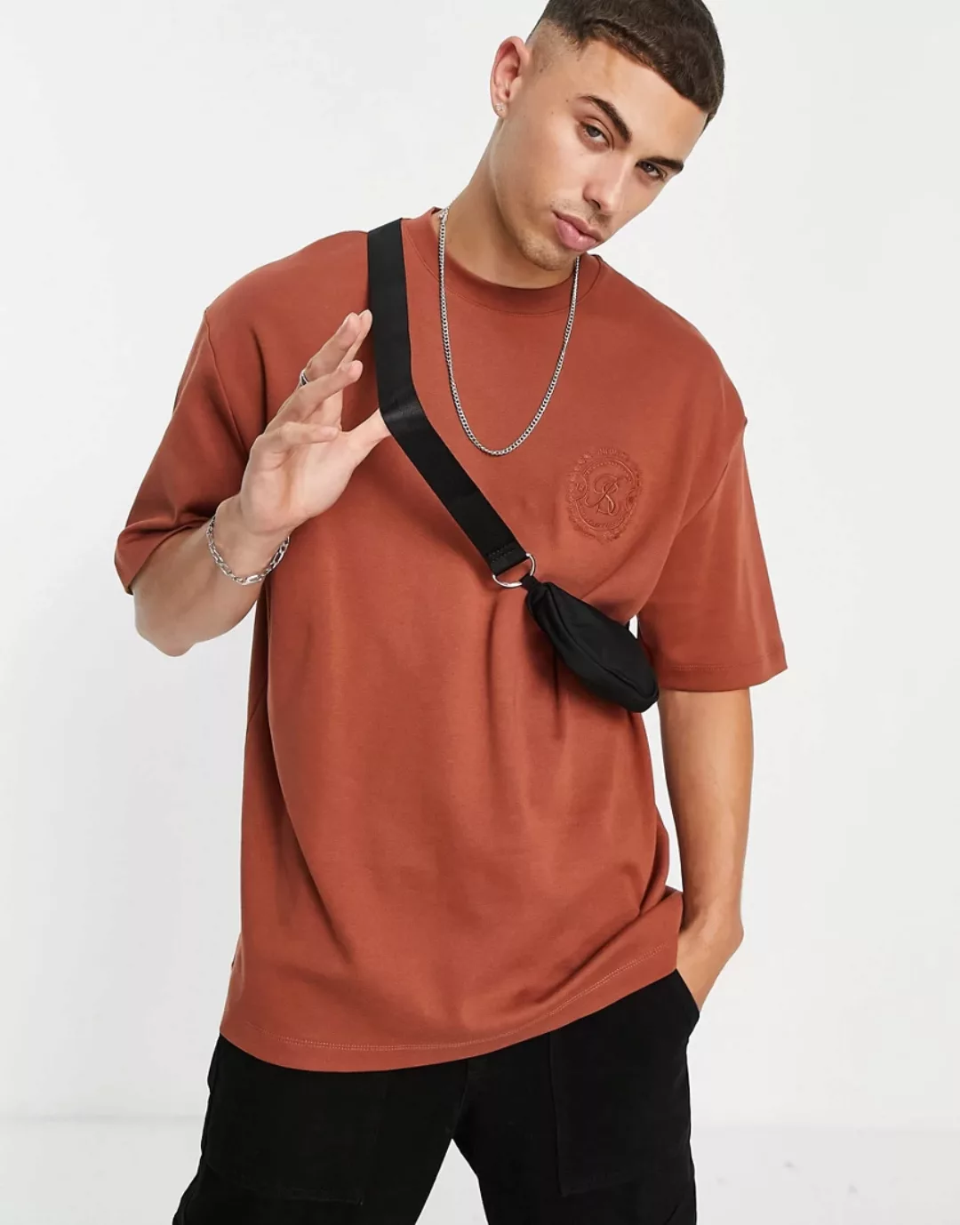 River Island – Oversize T-Shirt in Orange mit Print günstig online kaufen