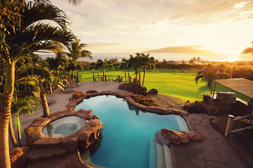 Papermoon Fototapete »LUXUS-HAUS-POOL PALMEN WIESE STRAND MEER SONNE INSEL« günstig online kaufen