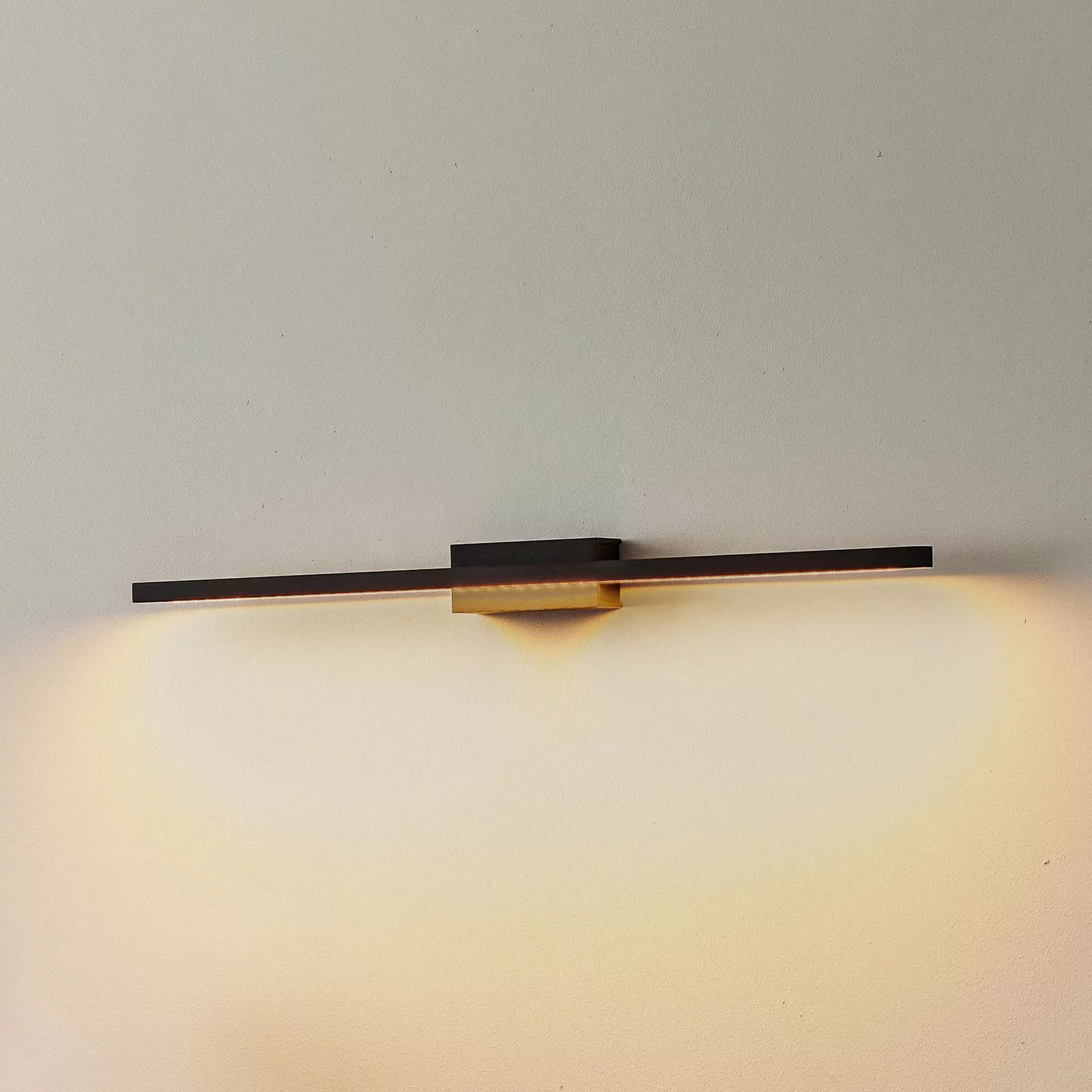 Quitani LED-Wandlampe Tolu, schwarz, Breite 65 cm günstig online kaufen