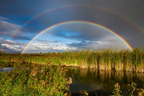 Papermoon Fototapete »REGENBOGEN ÜBER FLUSS-LANDSCHAFT NATUR HIMMEL WOLKEN« günstig online kaufen