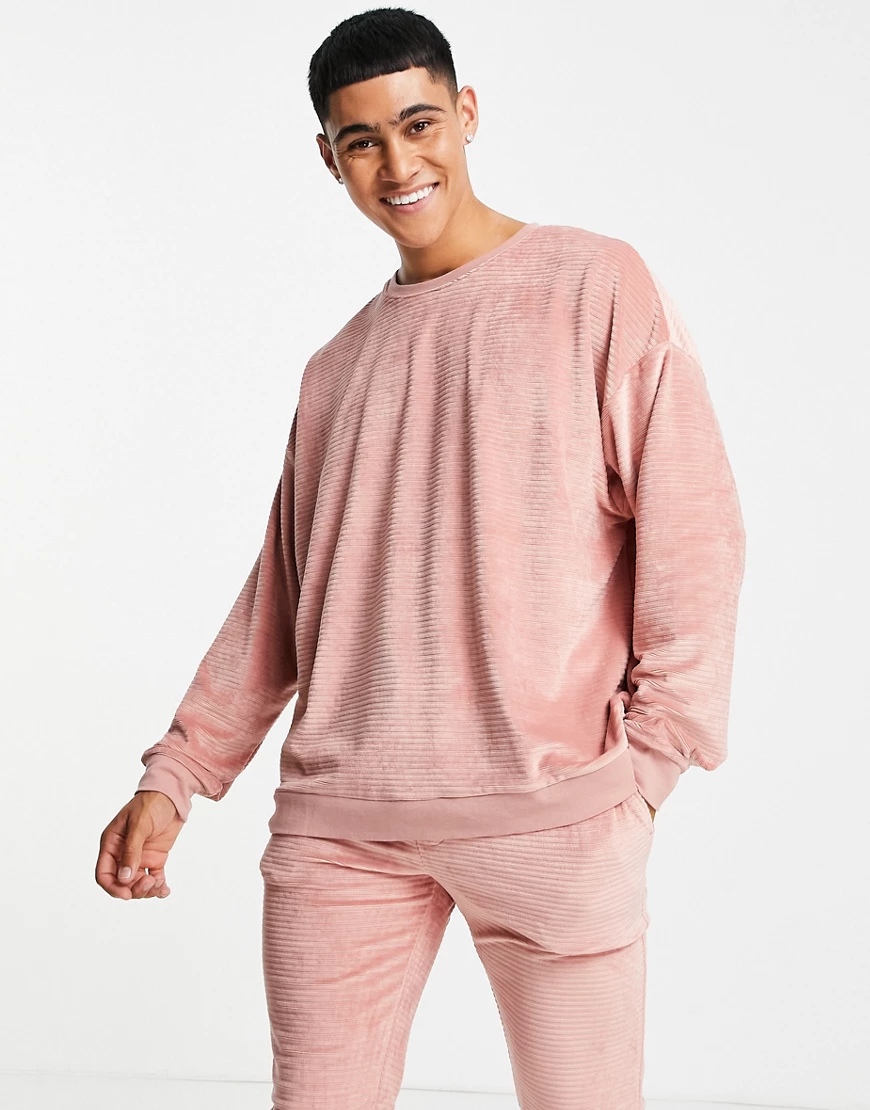 ASOS DESIGN – Gerippter, weihnachtlicher Velours-Pyjama in Rosa günstig online kaufen