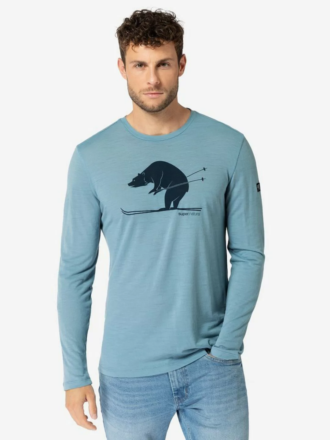 SUPER.NATURAL Langarmshirt für Herren, Merino SKI KARL Ski Motiv, atmungsak günstig online kaufen