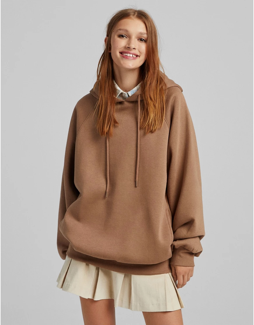 Bershka – Oversize-Kapuzenpullover in Beige-Rosa günstig online kaufen