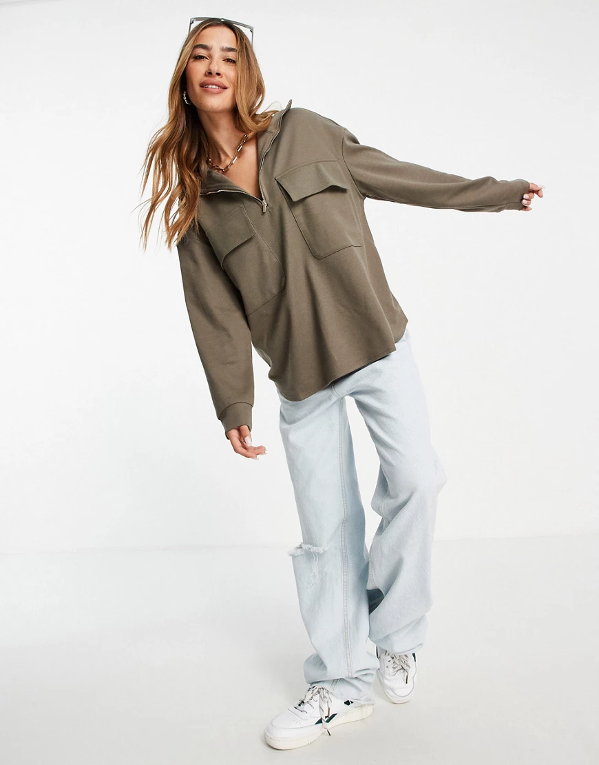Mango – Langärmliges Sweatshirt mit halbem Reißverschluss und Taschen vorne günstig online kaufen
