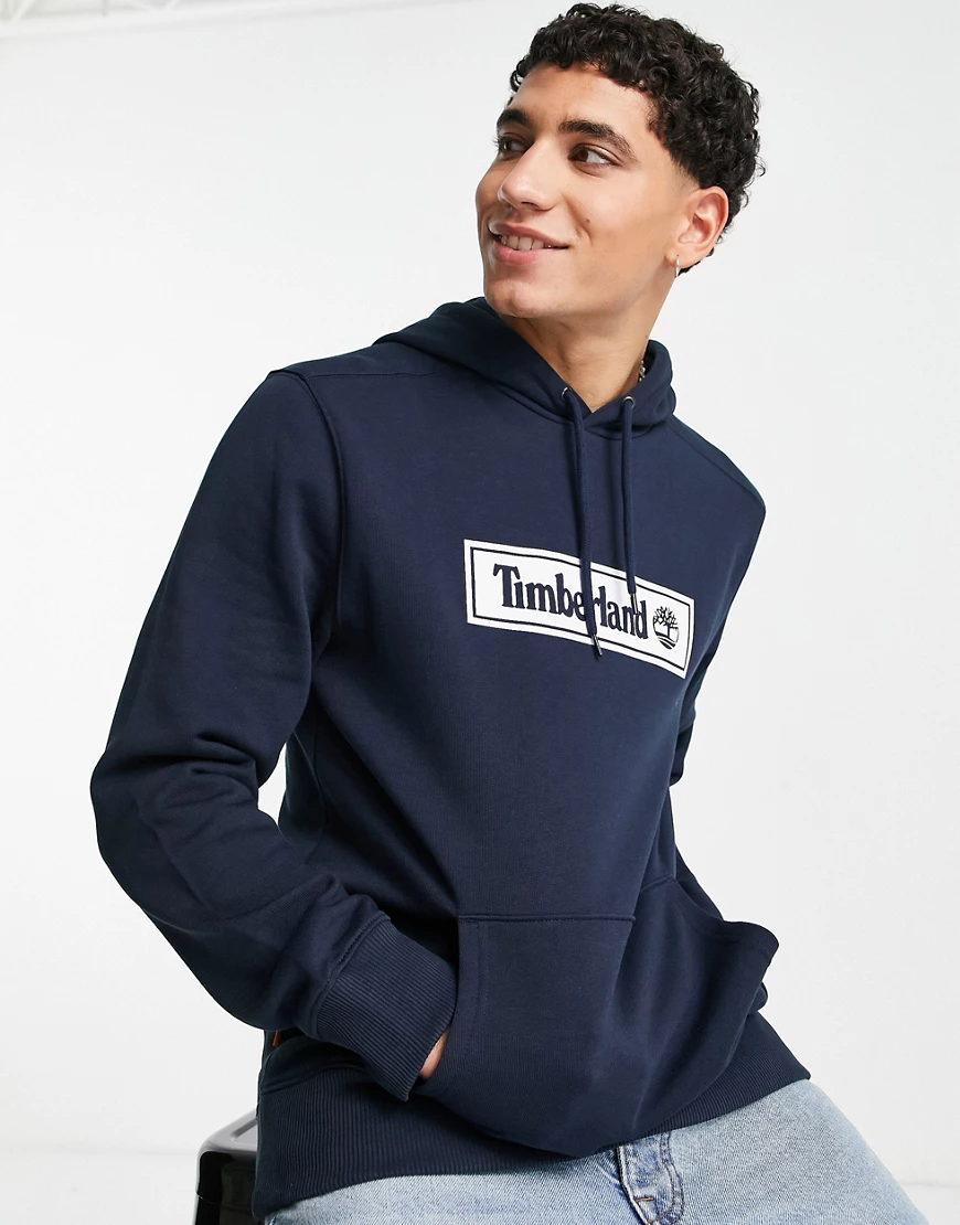 Timberland – Kapuzenpullover in Dunkelblau mit linearem Logo günstig online kaufen