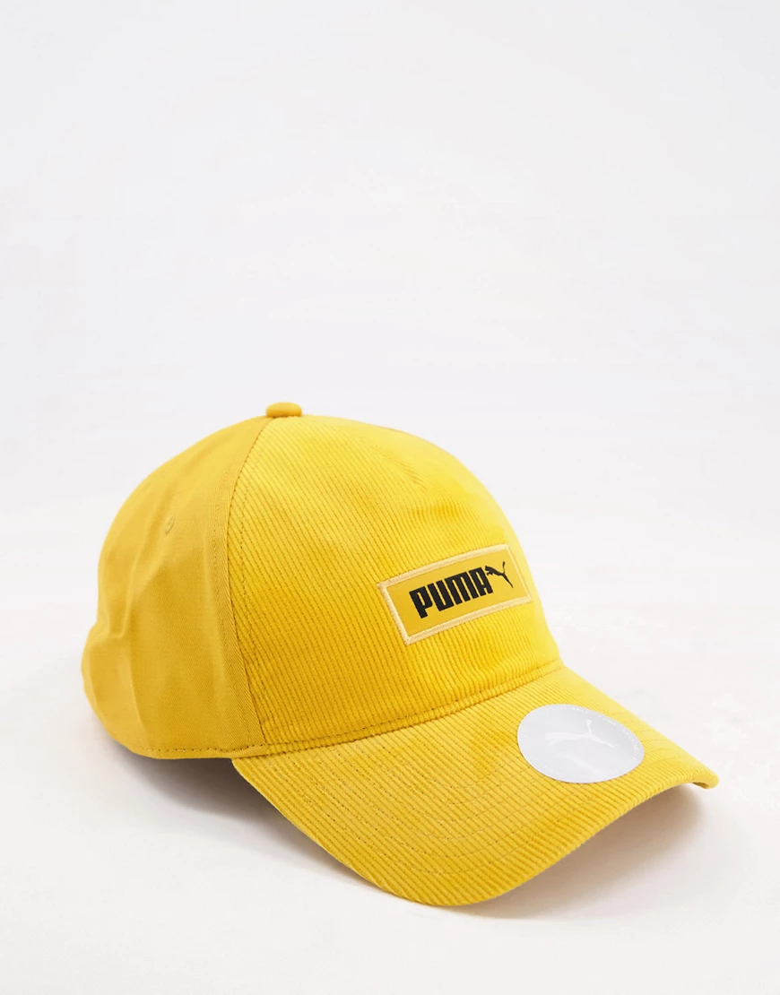 PUMA – Kappe in Mineralgelb mit Logo günstig online kaufen