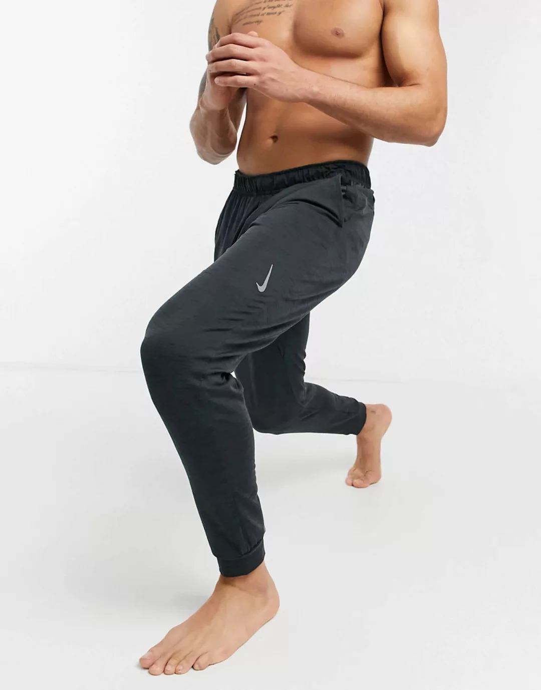 Nike – Yoga Dri-FIT – Jogginghose in Dunkelgrau günstig online kaufen