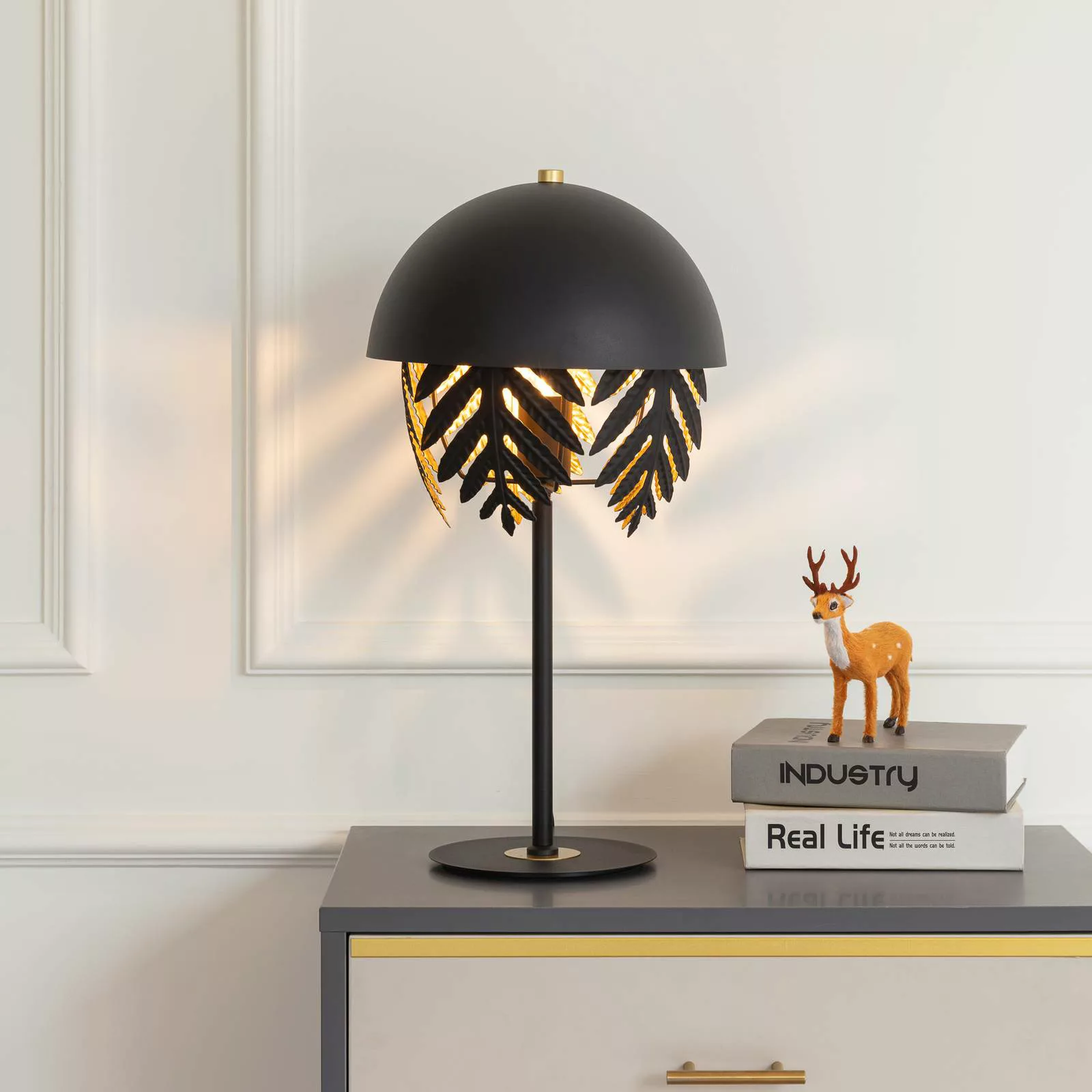 Lucande Aparas Tischlampe Blattoptik, schwarz-gold günstig online kaufen