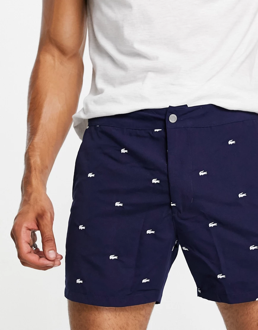 Lacoste – Badeshorts mit durchgehendem Logoprint-Marineblau günstig online kaufen