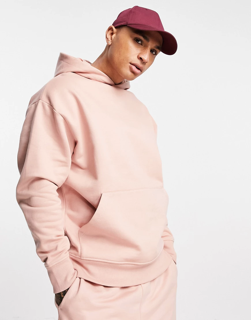 ASOS DESIGN – Schwerer Oversize-Kapuzenpullover aus Bio-Baumwolle in Rosa, günstig online kaufen