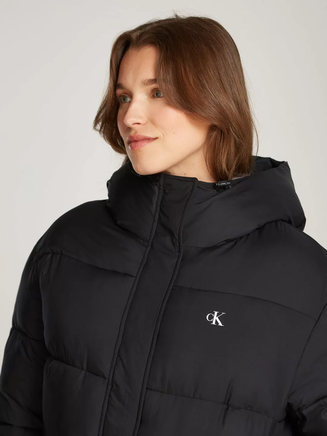 Calvin Klein Jeans Steppjacke LOGO SHORT HOODED PUFFER mit Logoprägung günstig online kaufen