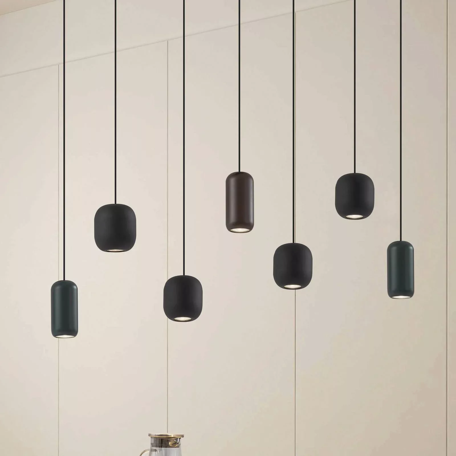 Lucande Hängelampe Narion, linear, schwarz/braun/grün, 7-flg günstig online kaufen