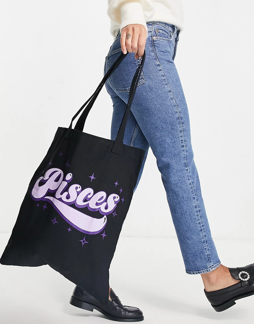 ASOS DESIGN – Shopper aus Baumwolle in Schwarz mit „Pisces“-Textprint günstig online kaufen