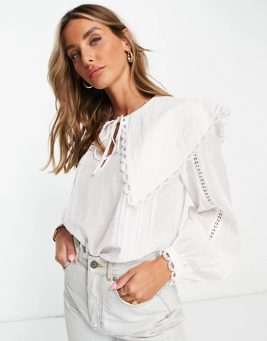 River Island – Bluse in Weiß mit Spitzenbesatz und Kragen günstig online kaufen