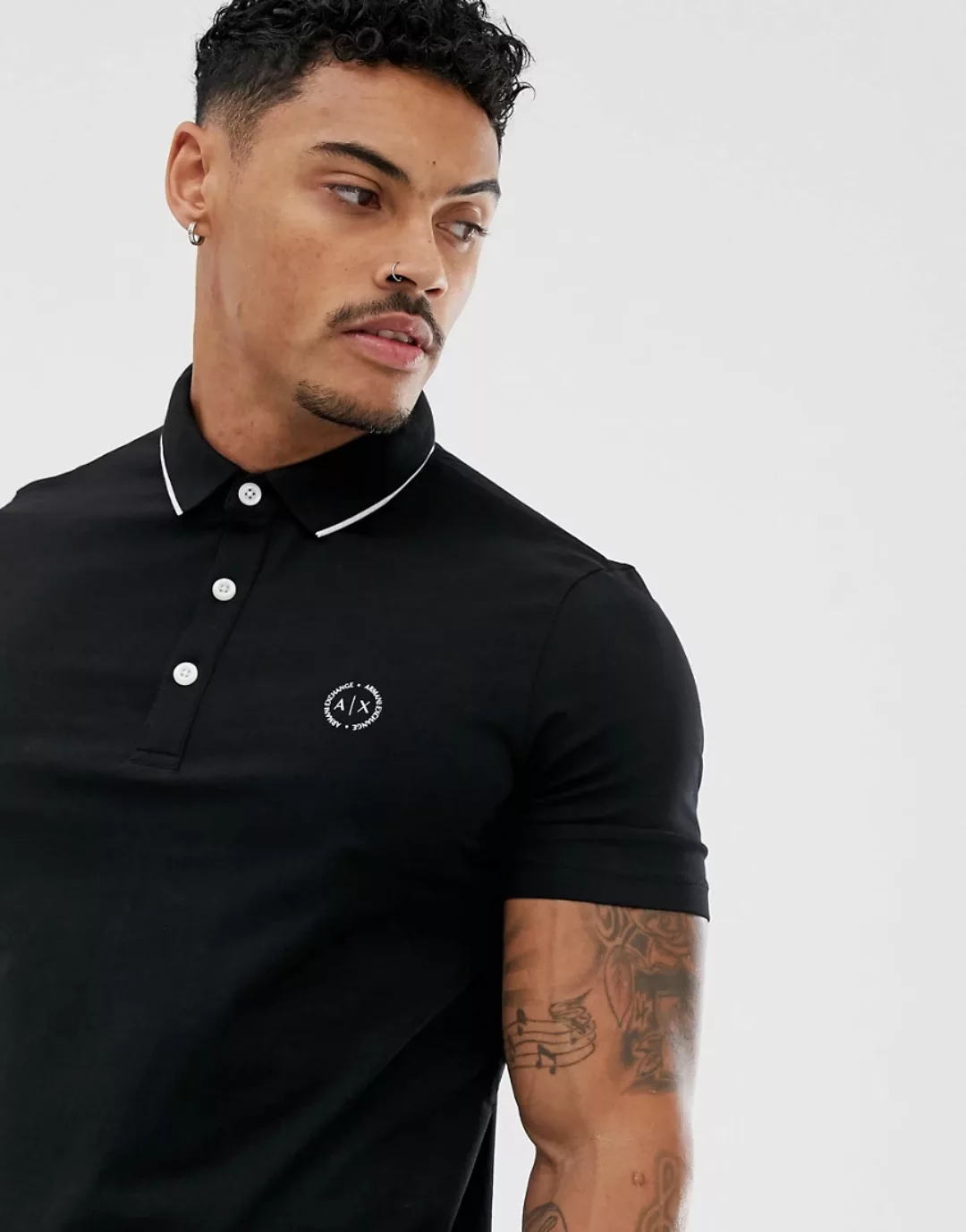 Armani Exchange – Polohemd in Schwarz mit schmaler Passform und Kontraststr günstig online kaufen