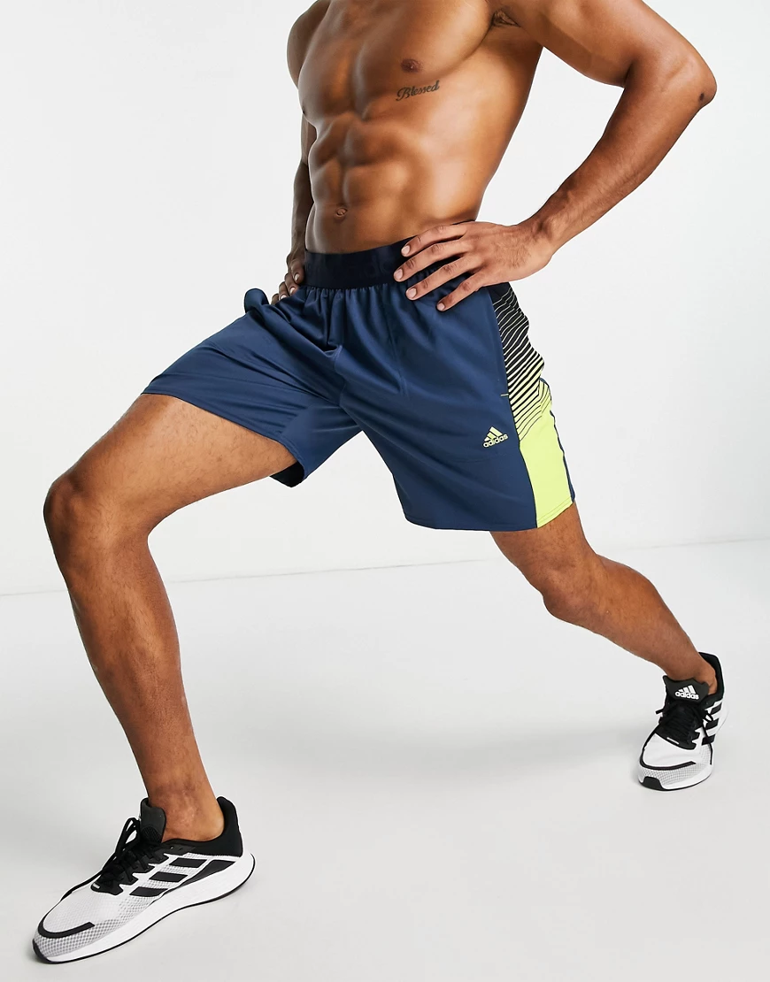 adidas – Training – Shorts mit seitlichen Streifen in Marineblau günstig online kaufen