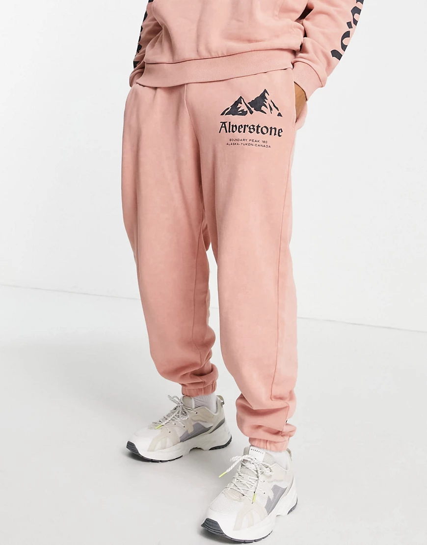 ASOS DESIGN – Jogginghose in rosa Waschung mit Ballonschnitt und aufgedruck günstig online kaufen