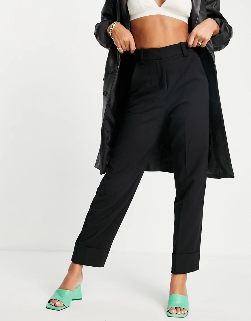 & Other Stories – Elegante Hose aus recyceltem Polyester in Schwarz mit Ums günstig online kaufen