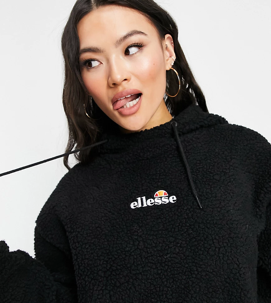 ellesse – Kapuzenpullover aus Teddyfell in Schwarz mit Logo günstig online kaufen