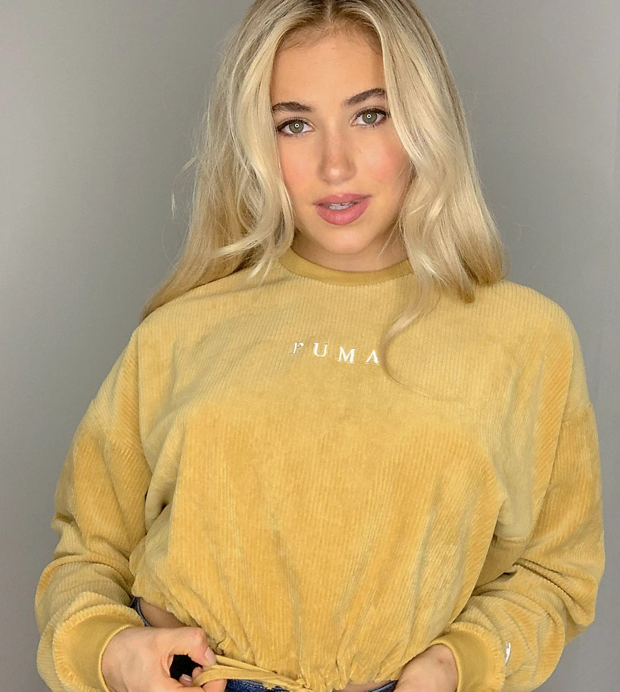 Puma – Kurzes Sweatshirt aus Cord mit Rundhalsausschnitt in Senfgelb, exklu günstig online kaufen