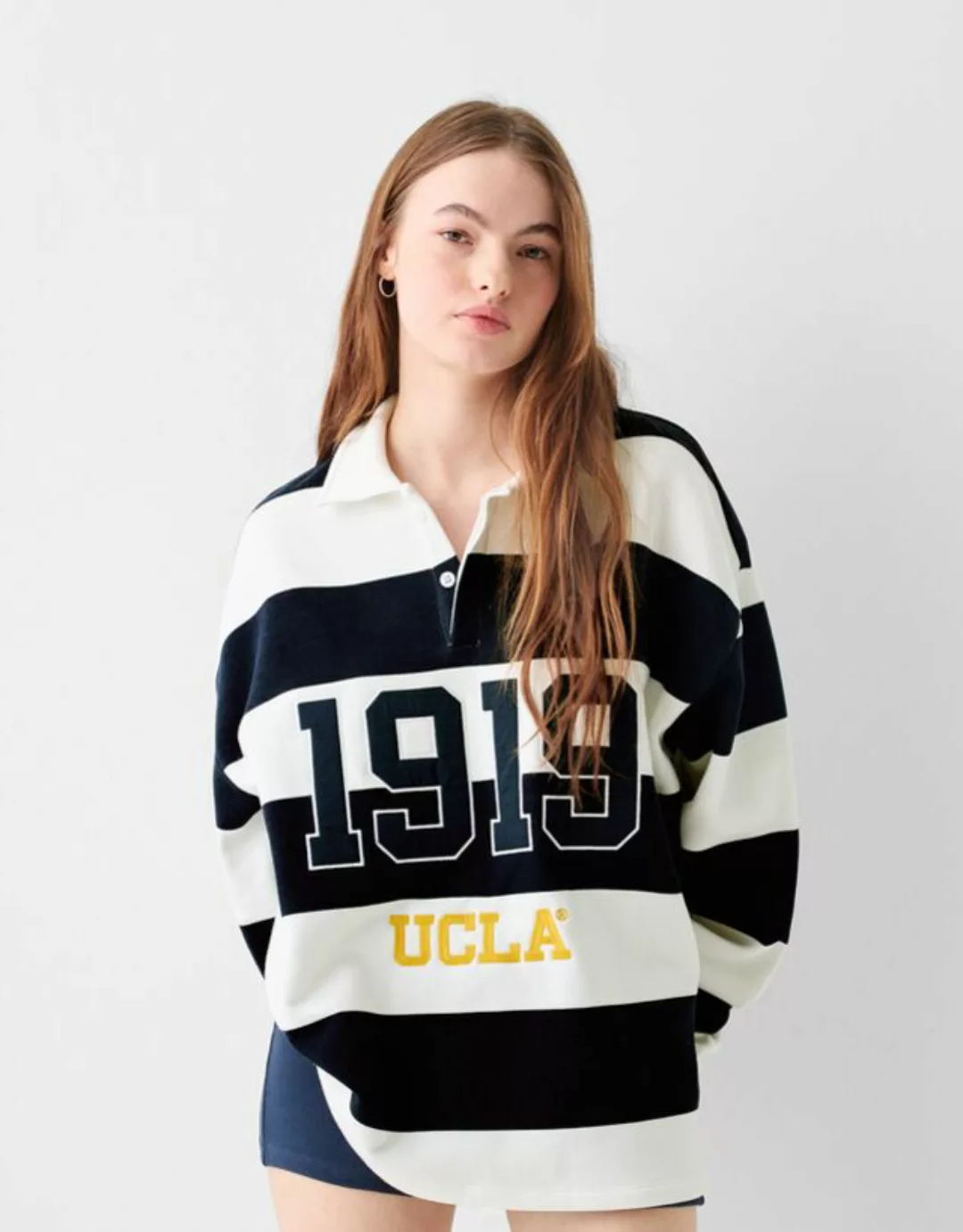 Bershka Sweatshirt Ucla Mit Polo-Kragen Und Stickerei Bskteen M Grbrochenes günstig online kaufen