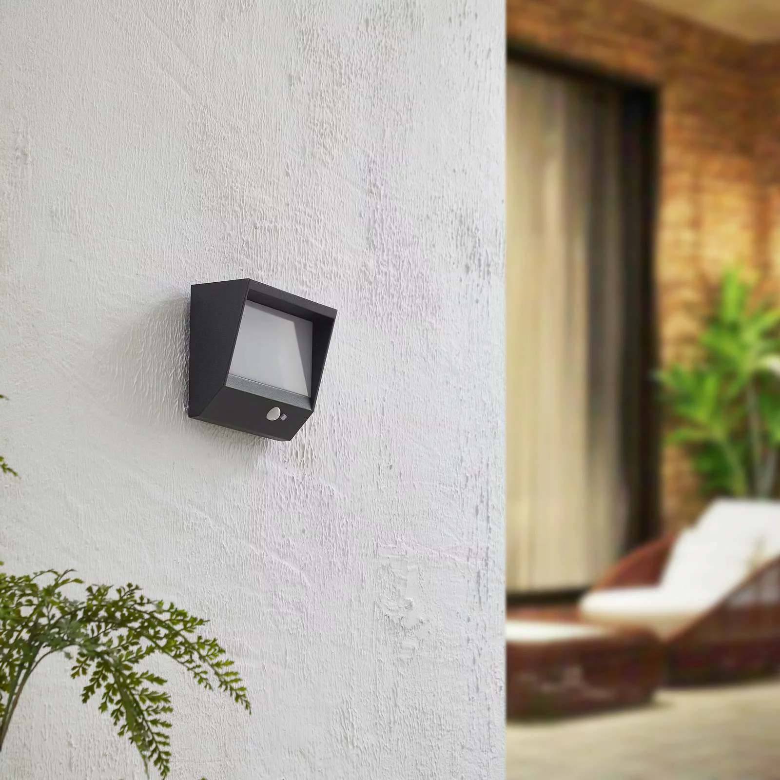 Lucande LED-Solar-Außenwandlampe Dava, Höhe 14 cm, Sensor günstig online kaufen