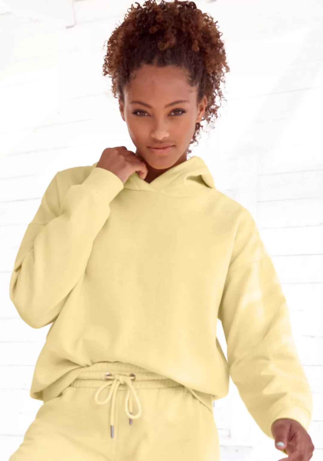 Buffalo Hoodie -Kapuzensweatshirt mit Rückenprint und Rippbündchen, Loungea günstig online kaufen