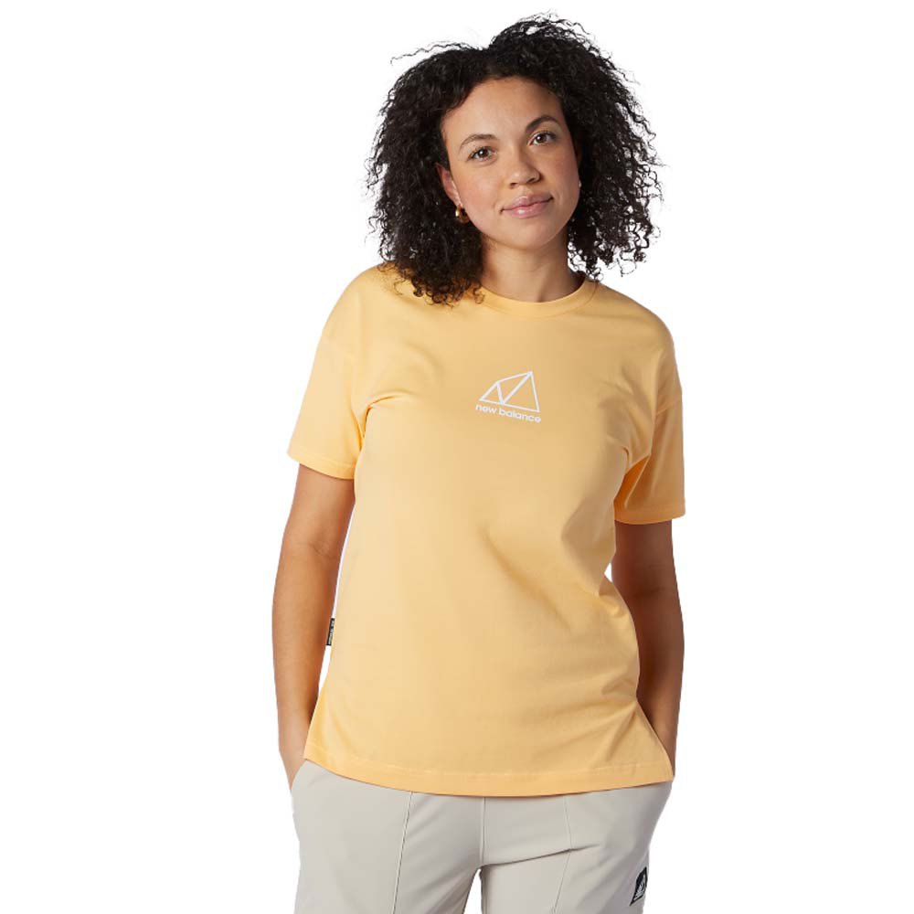 New Balance Terrain Graphic Kurzarm T-shirt M Light Mango günstig online kaufen