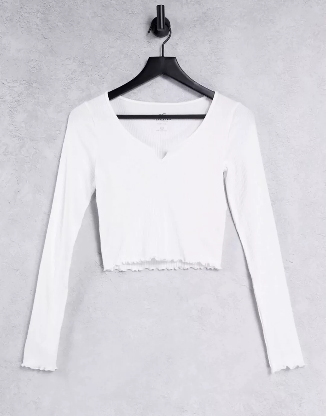Hollister – Langärmliges Shirt mit Wellensaum in Weiß günstig online kaufen