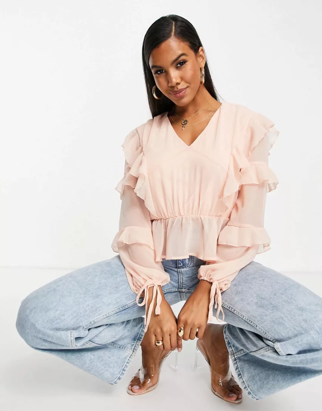 Missguided – Bluse mit Schößchen und gerüschtem Saum in Rosa günstig online kaufen