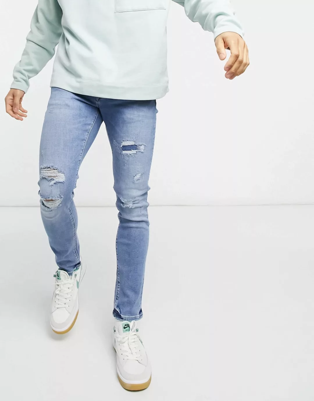 River Island – Enge Jeans mit Zierrissen in Hellblau günstig online kaufen